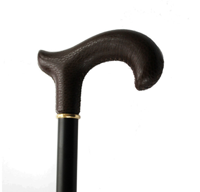 wooden walking stick with brown leather handle